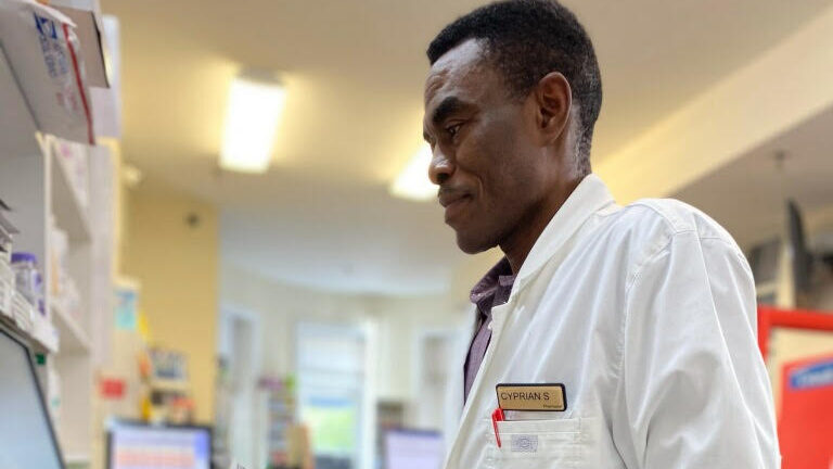 Cyprian Sabah (pictured) and his partner Alfred Addico spend part of their day delivering prescriptions to customers around Washington, D.C. (Courtesy of Cyprian Sabah)