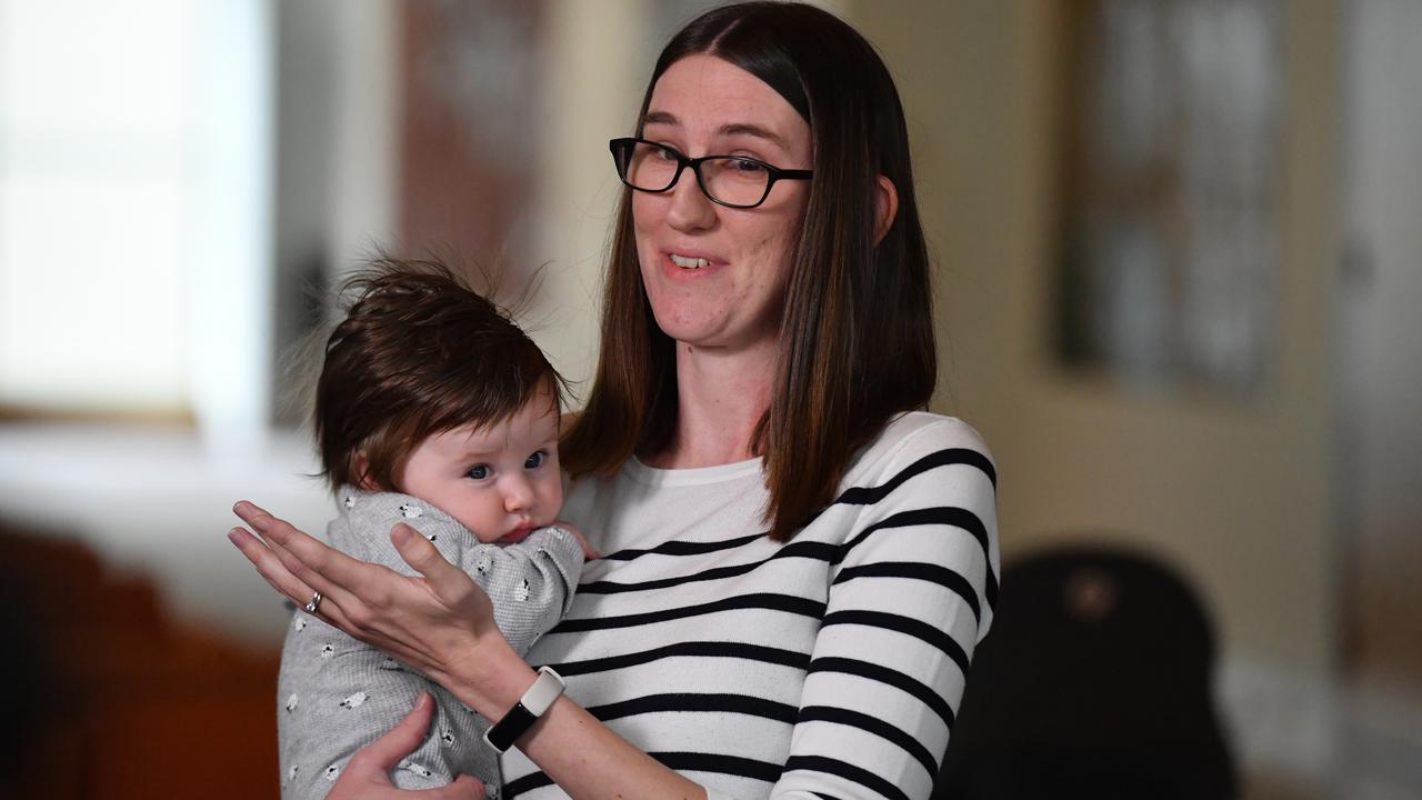 Sophie Robinson, with baby Lucy,  says she can't return to work without support from her UK family.