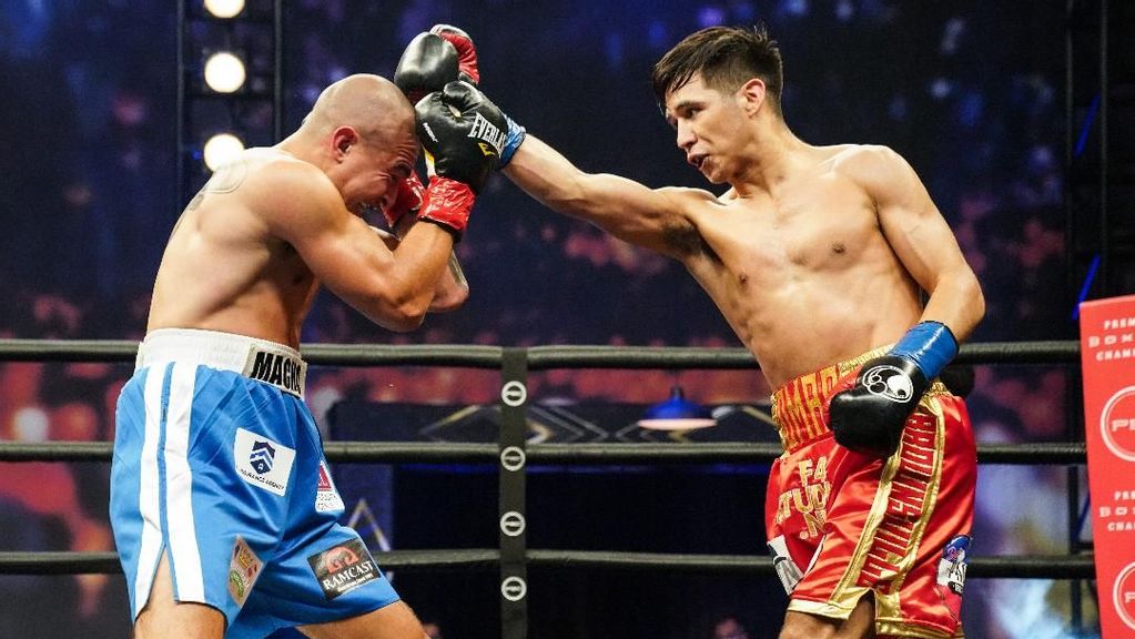 Omar Juarez throws a partially blocked right hand at Elias Araujo's head in a bout Juarez won on April 17. (Sean Michael Ham/TGB Promotions) 