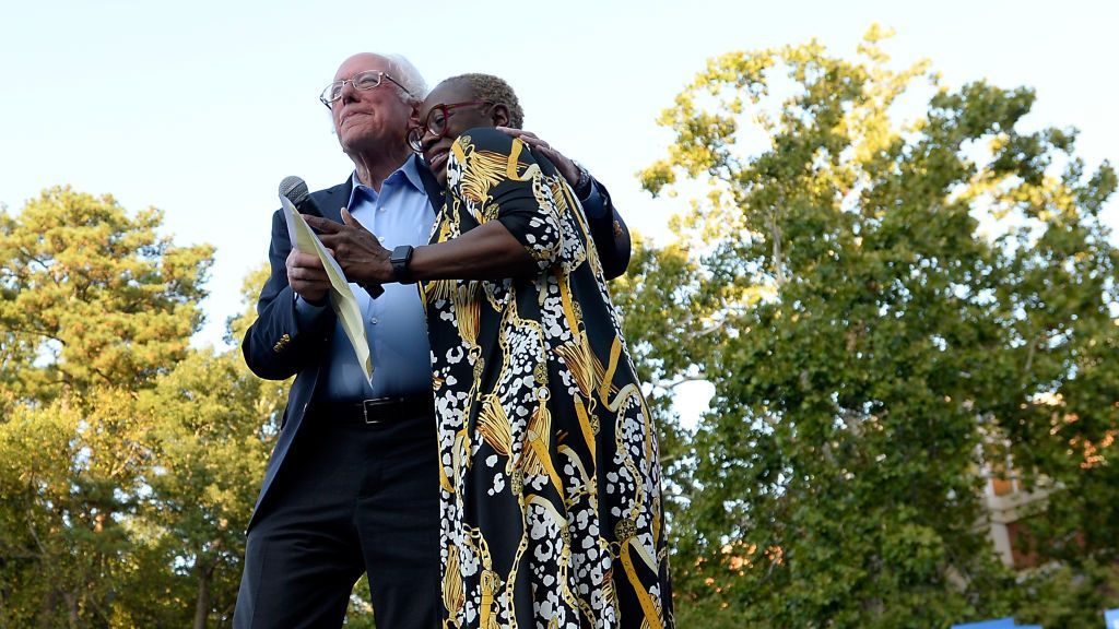 Sen. Bernie Sanders (I-Vt.) and his campaign chief Nina Turner, now a candidate for Ohio's vacant 11th congressional district, hug on stage during a campaign rally in Sept. 2019 (Sara D. Davis/Getty Images)