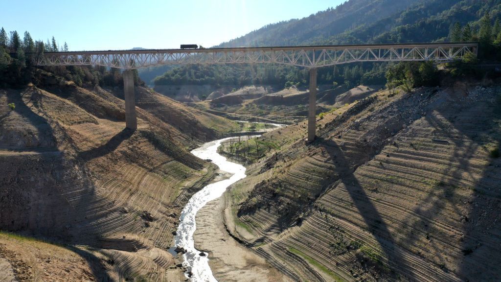 The Enterprise Bridge crosses over a section of California's Lake Oroville that was previously underwater. Officials say Lake Oroville's Edward Hyatt Powerplant might be forced to shut down by August or September if levels continue to drop. (Justin Sullivan/Getty Images)