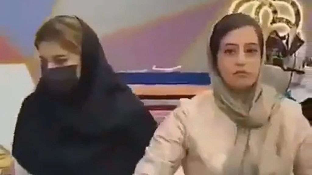 Judicial authorities arrest shop owner and several female models for not wearing hijab. Note: Picture is a screenshot from a video (Zenger News)