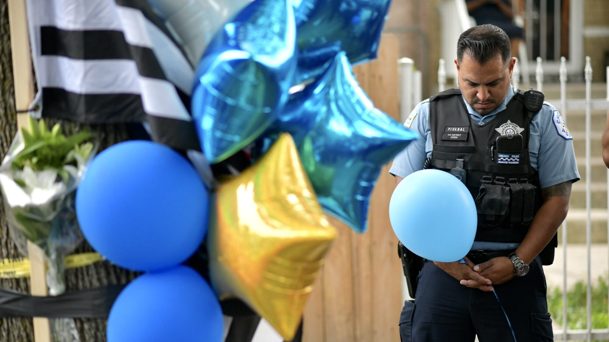 One of the hundreds of police officers who attended a vigil Monday night to honor slain Chicago officer Ella French. (@Chicago_Police/Zenger)